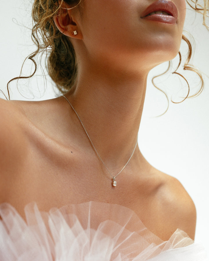 Oorstekers Nora 0,50 crt. witgoud